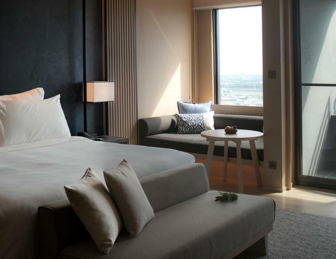 Mu Jiaoxi Hotel Exterior photo A bedroom at the hotel